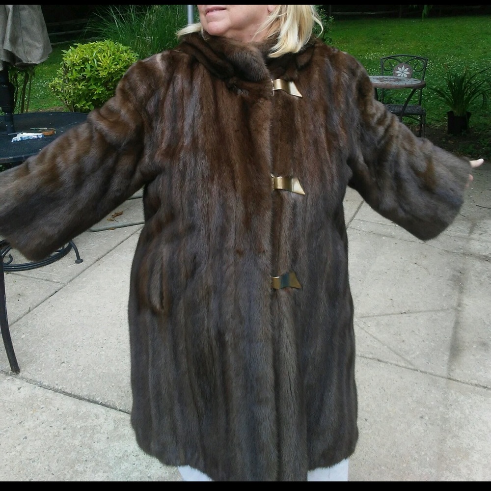 Fur coat with solid brass hardware